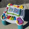 Fisher-Price Baby to Toddler Toy Laugh & Learn Around the Town Learning Activity Table - Image 2